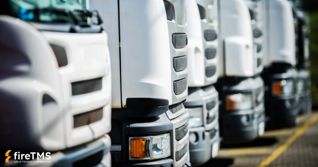 Maski ciągników siodłowych stojących na parkingu